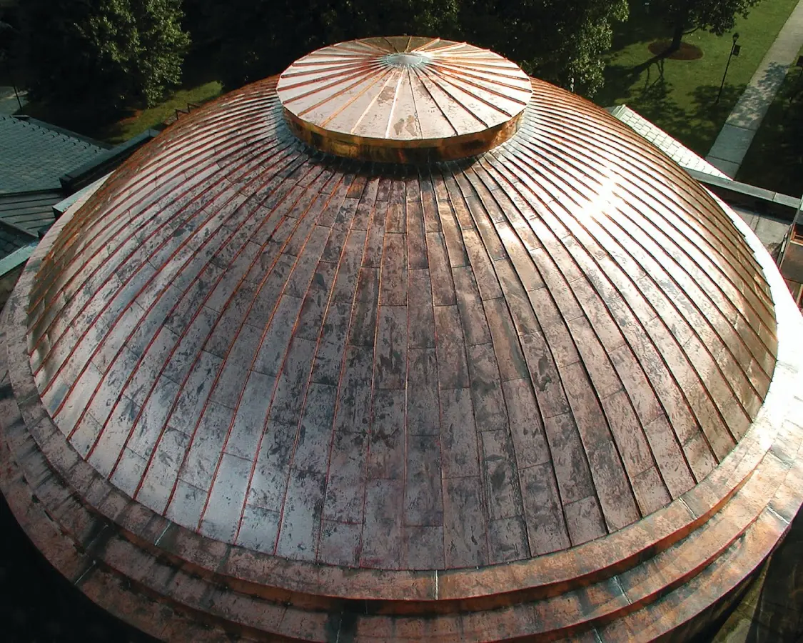 Craftsman Roofing crew installing a new roof in West Roxbury